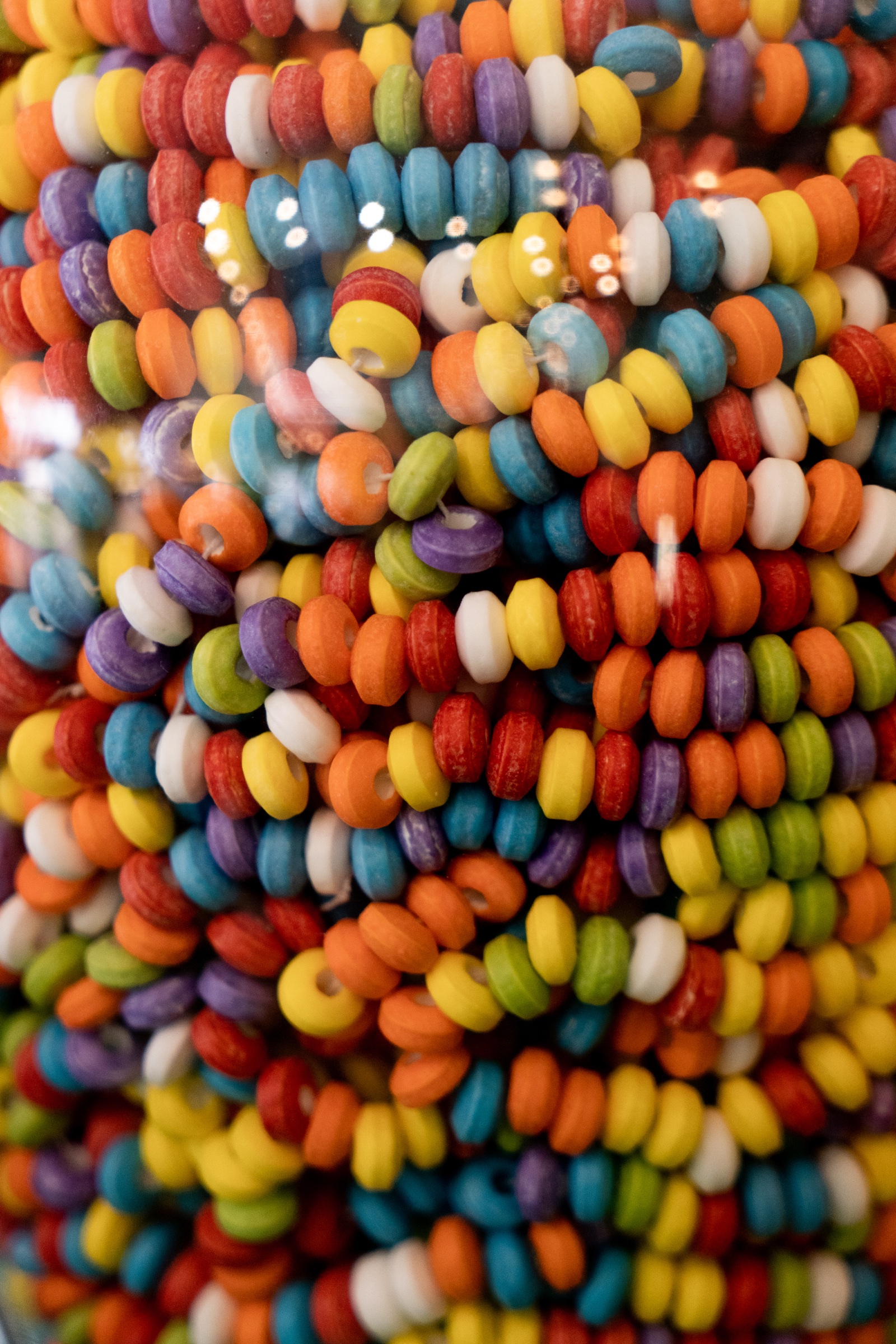 Colourful sweets filling the frame in a dense pattern